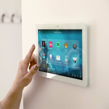 This image shows someone using an app on their ipad to control their home theatre system.