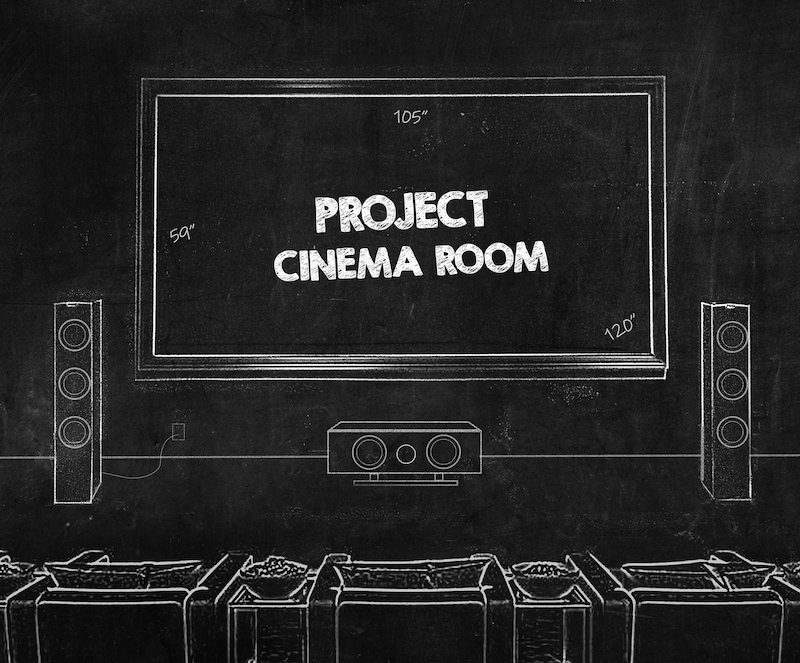 Home theatre system with two speakers
			and a large TV showing the post-apocalyptic movie Mad Max